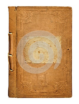 Old worn book cover with ornamental pattern