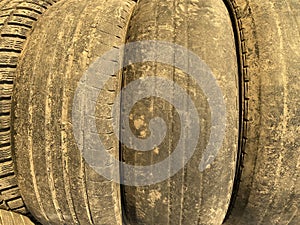 Old worn car tires close up