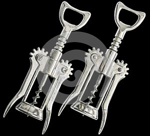 Old Worn Chrome Plated Wing Corkscrew Front And Reverse Side Variants Isolated On Black Background