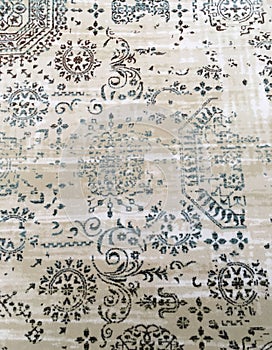 Old worn out elegant damask pattern carpet / floor covering. Luxury grunge vertical background