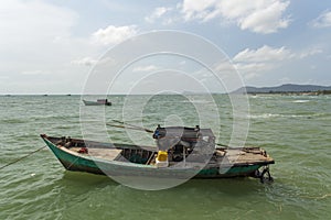 Old worn out fishing boat on the sea outside Phu Quoc Island, Vietnam