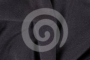 Old worn-out polyester and elastane fabric, pilling and frayed threads