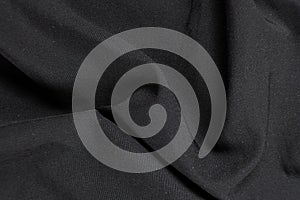 Old worn-out polyester and elastane fabric, pilling and frayed threads