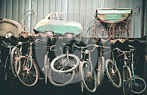 Old worn out strollers and bicycles