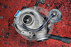 Old worn out turbocharger of a turbo diesel engine