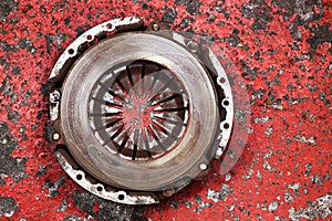 An old worn out vehicle clutch