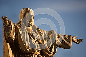 Old, worn statue of Jesus Christ photo