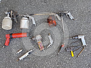 Old worn used tools on ground