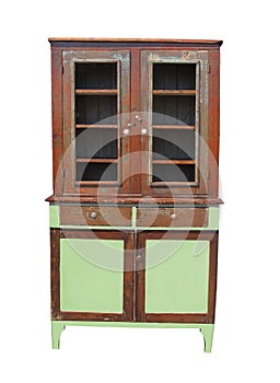Old and worn wooden cupboard isolated. photo