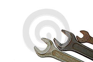 Old wrench isolated on white background