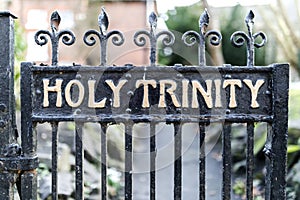 Old wrought iron Holy Trinity Rectory Gates with peeling paint a