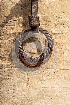 Old wrought iron ring to tie the horses - Bologna Italy