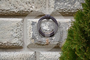 Old wrought iron ring to tie horses. Greve in Chianti, Italy