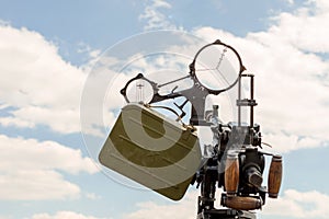 Old ww2 anti-aircraft machine gun. Close-up front view with cannon aim against clear blue sky