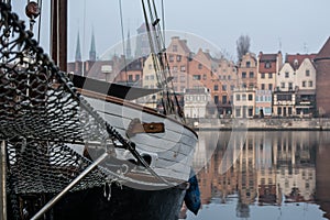 Old yacht moored on MotÅ‚awa in Gdansk.