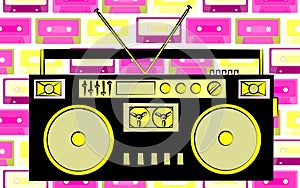 Old yellow and black retro vintage antique hipster obsolete cassette music audio tape recorder on a background of purple music aud