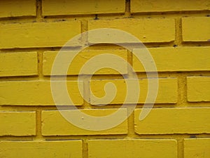 old yellow bricks outdoor wall texture background