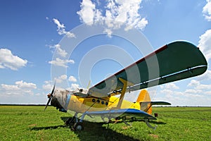 Crop duster airplane on airfield