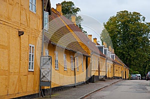 Old yellow houses in town of Soro in Denmark photo