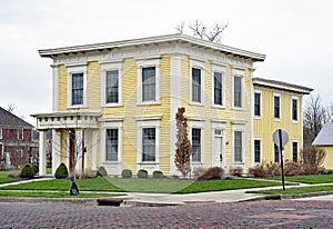 Old Yellow Italianate Square House photo