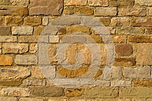 Old yellow stone wall background