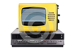 Old yellow vintage TV with noise and interference on the screen VCR isolated on a white background. photo