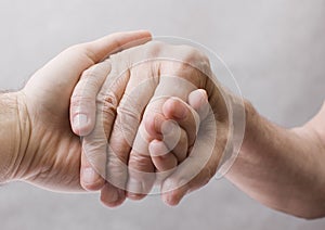 Old and young hand