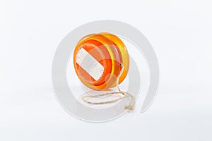 Old yoyo orange isolated