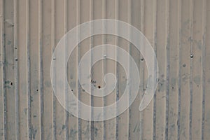 Old zing wall,background of peeling paint and rusty old metal.zinc wall texture pattern background rusty corrugated metal old