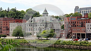 Olde Federal Building, landmark edifice, waterfront view across the Kennebec River, Augusta, ME, USA