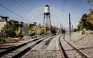 Olde town arvada Colorado water tower and train tracks