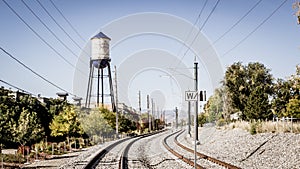 Olde town arvada Colorado water tower and train tracks