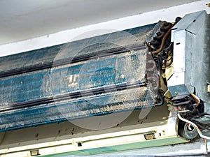 Older air conditioner in the wash. After not maintaining it for a long time. Dusty interior And the parts are rusty. Accumulating