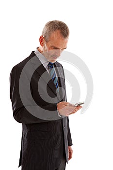 Older business man with smart phone