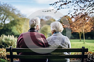 An older couple sitting on a bench in a park, AI