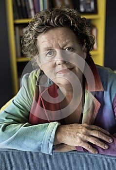 Older lady, portrait smiling woman in her 60s.