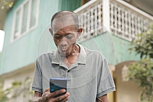 An older man amazed at seeing a sexy picture or an interesting social media post on his cellphone. Making an inadvertently funny