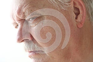 Older man is angry or suspicious