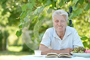 Older man with book