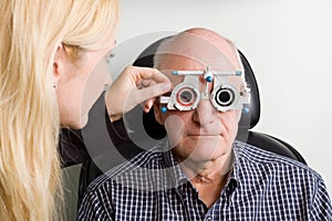 Older man having eye examination