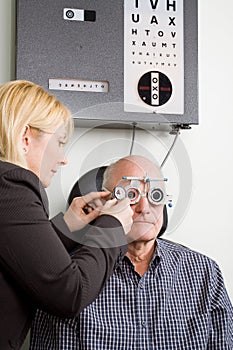 Older man having eye examination