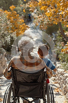 Older Man in Wheelchair With Young Boy