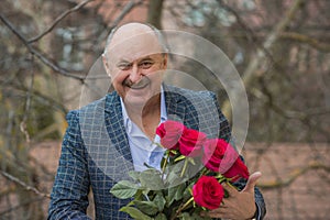 Older men with bouquet of roses, lifestyle of old men