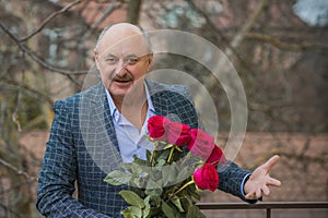 Older men with bouquet of roses, lifestyle of old men