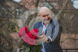 Older men with bouquet of roses, lifestyle of old men