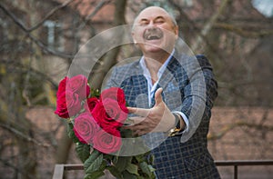 Older men with bouquet of roses, lifestyle of old men