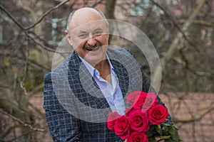 Older men with bouquet of roses, lifestyle of old men