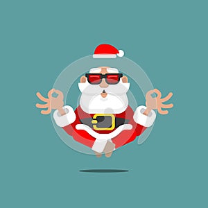 Older Santa Claus in meditation levitating in the air with sunglasses in a relaxing mental position of Yoga symbolizing a spiritua photo