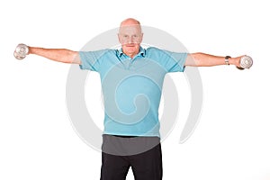 Older senior man lifting weights