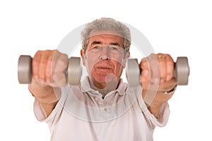 Older senior man lifting weights